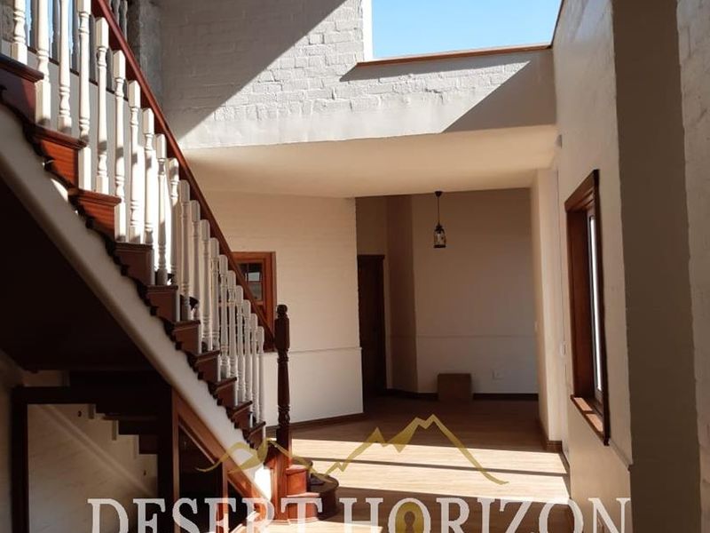 Erongo , Rossmund | Charming Double-Storey Home with Modern Amenities and Scenic Surroundings - Photo 4