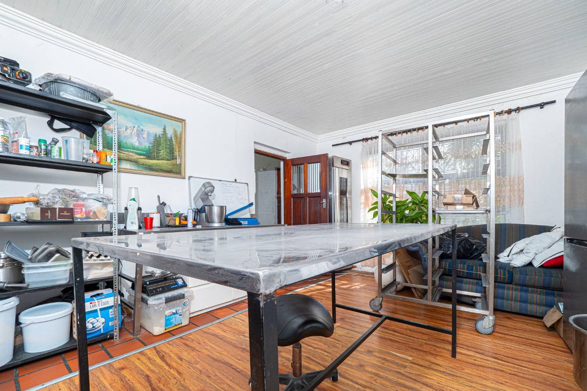 This Versatile Double-Storey property offers the perfect opportunity for renovation and customization with independent Upper and Lower Living (Homes) - Photo 2