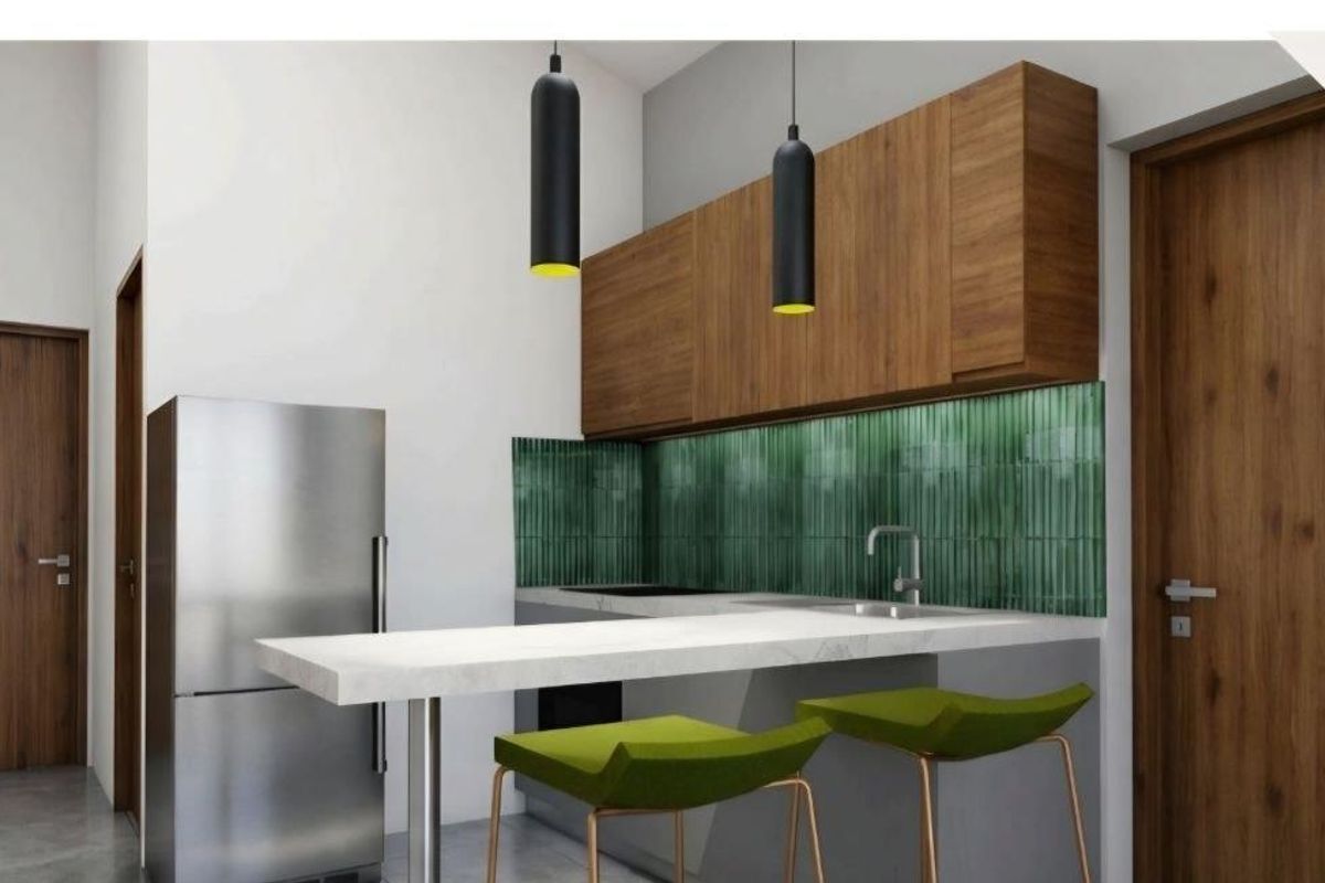 Modern kitchen featuring wood-finish cabinetry, a stone breakfast bar, green tiled backsplash, and contemporary pendant lighting.