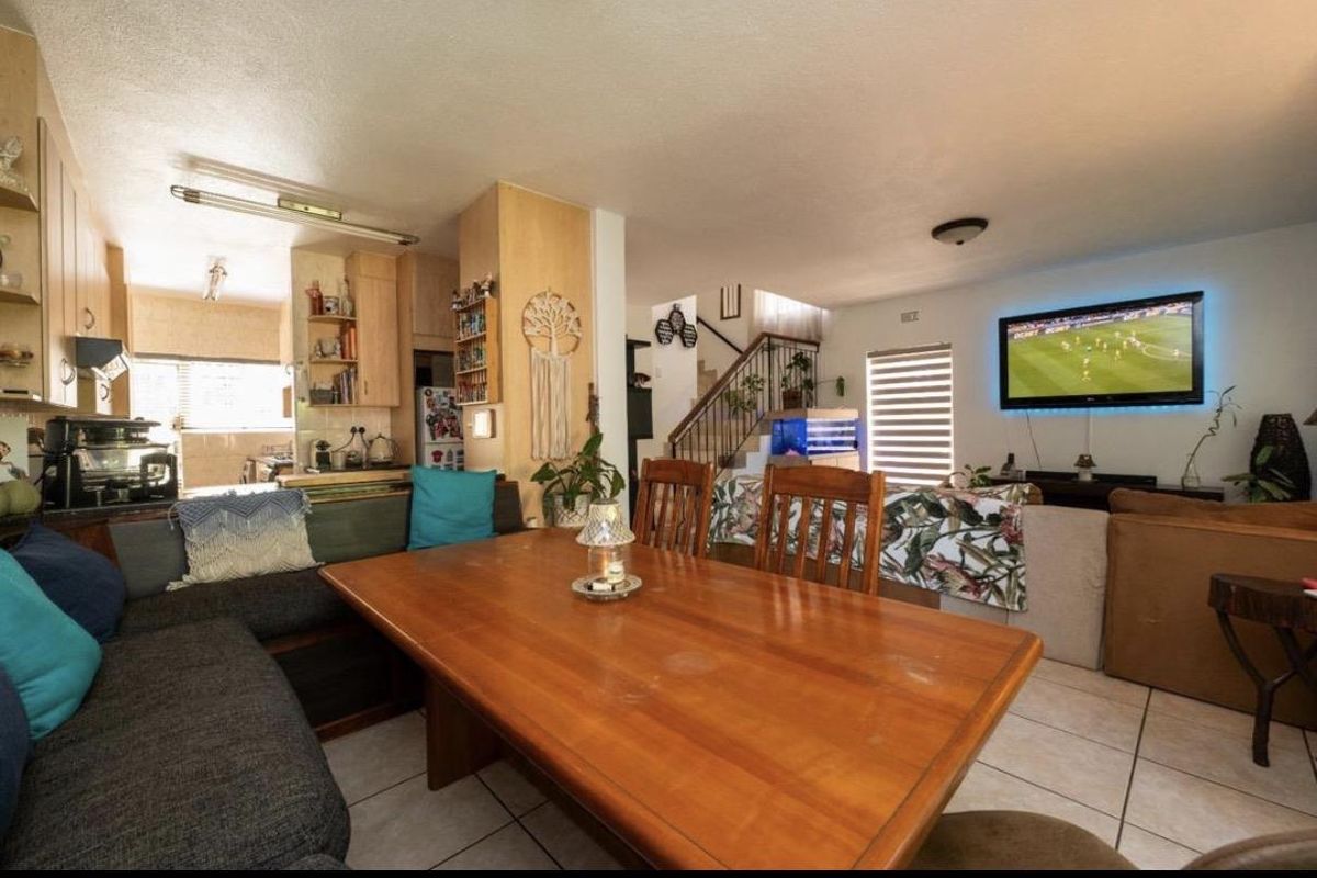 Elevated Family Living in a Secure Glenvista Setting - Photo 4
