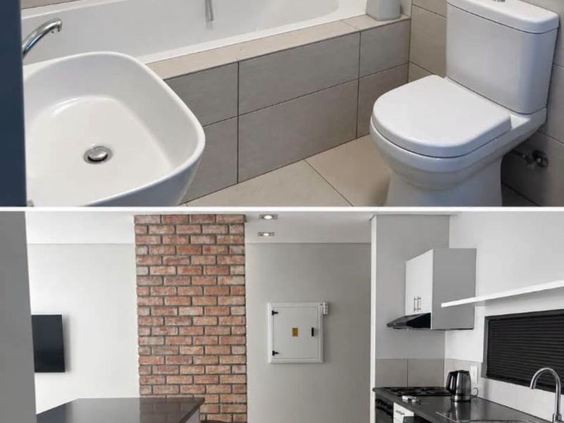 A composite image showing a modern bathroom with tiled finishes and an open-plan kitchen featuring an exposed brick wall and contemporary cabinetry.