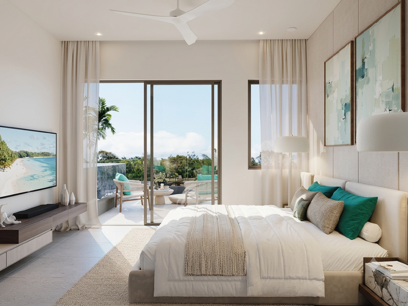 Modern bedroom featuring elegant wall paneling, recessed lighting, a ceiling fan, and large sliding glass doors opening to a private balcony.