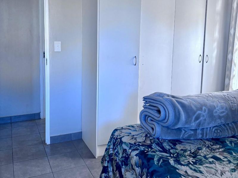 **Spacious 3-Bedroom with build in cupboards in secure community,with added seabreeze*** - Photo 10