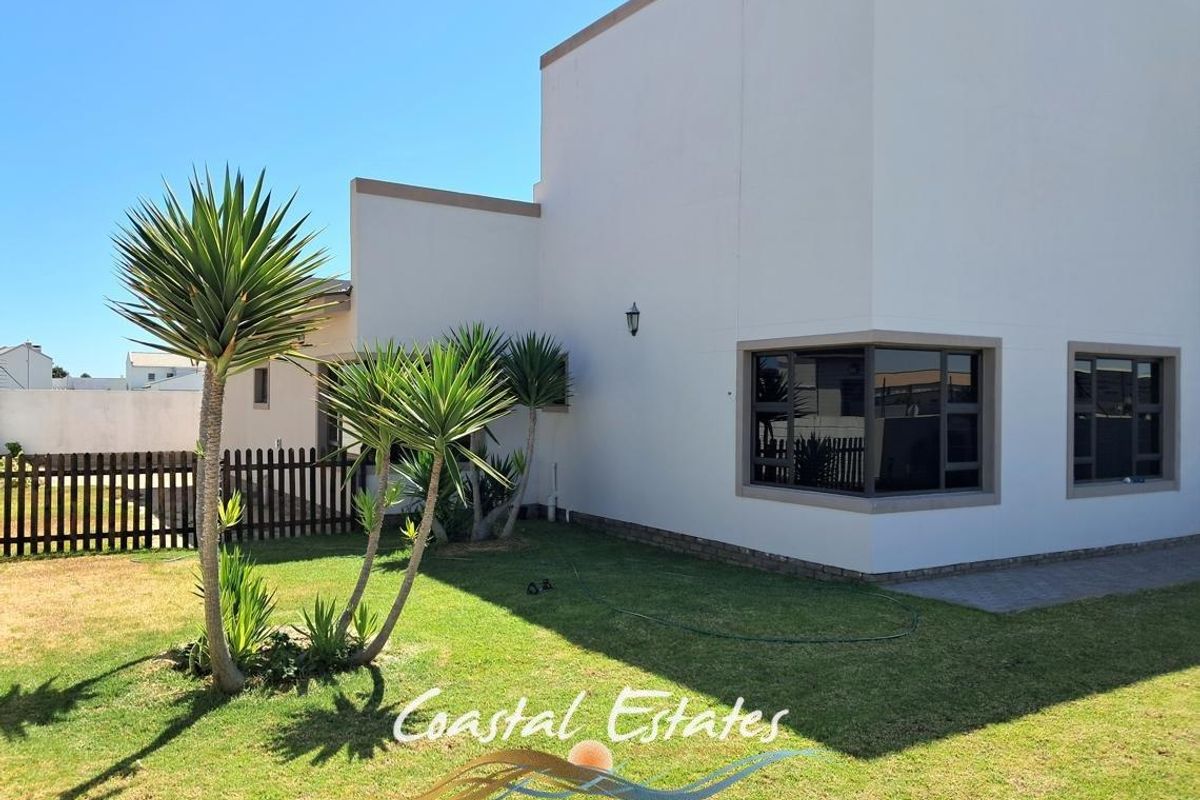 Stunning 4-Bedroom Family Home in Ext. 15 - Photo 3