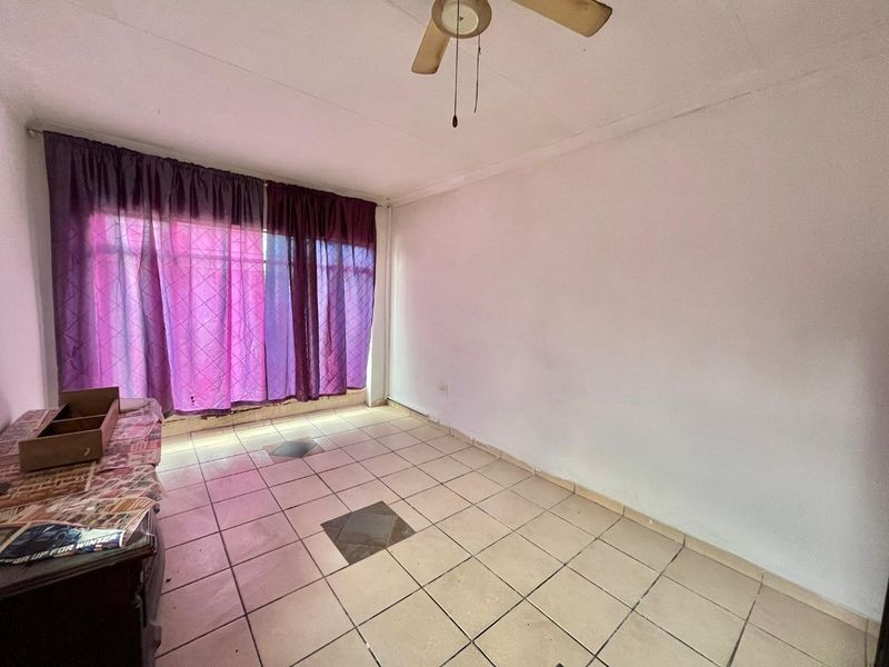 Fixer-Upper Awaits!  Three bedroom house with a potential flat and double garage fit 4 cars - Photo 6