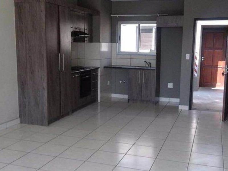 Unlock the door to your future at Hosea Kutako Apartments! For just N$800,000, you can own this charming 62m2 haven. - Photo 2