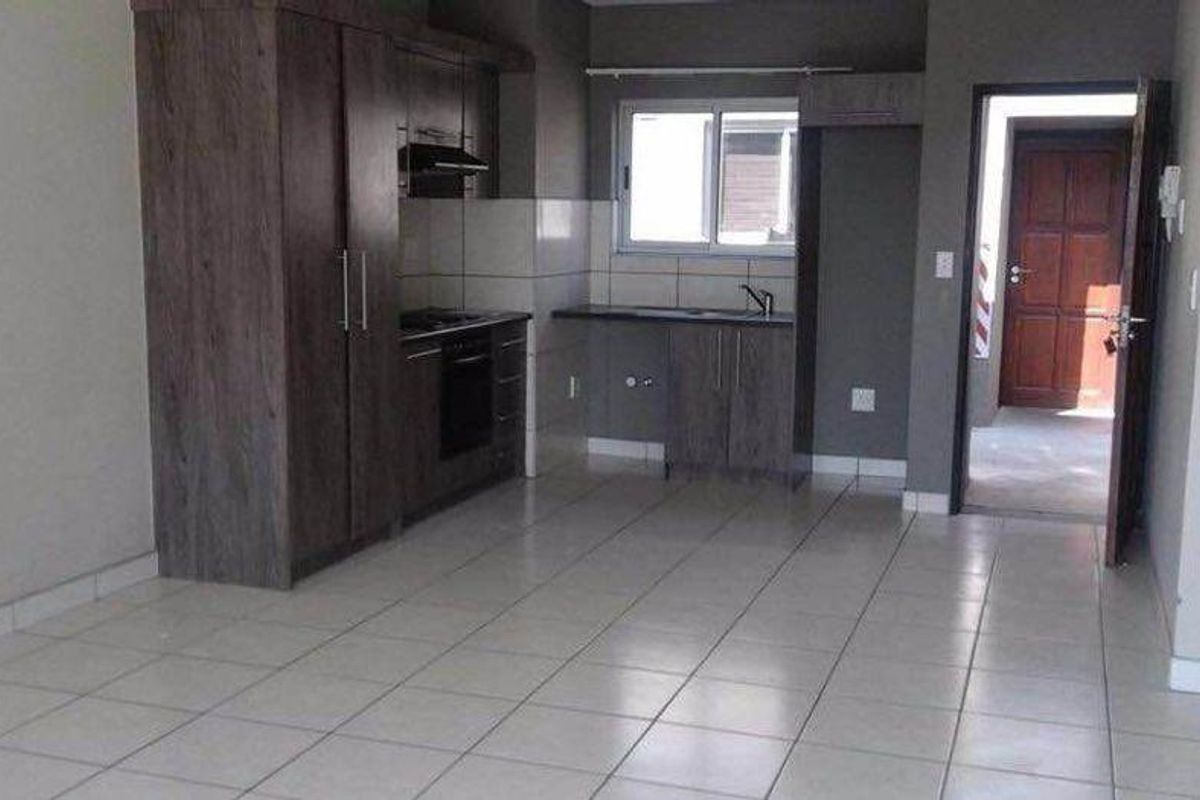 Unlock the door to your future at Hosea Kutako Apartments! For just N$800,000, you can own this charming 62m2 haven. - Photo 2