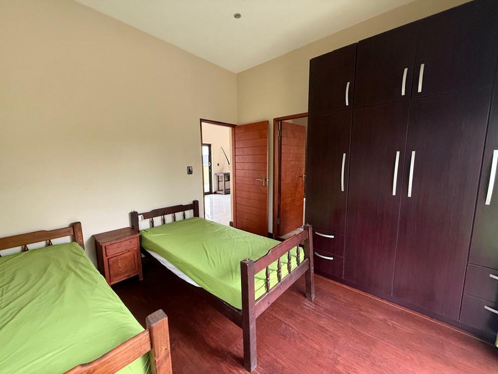 Ground floor, bedroom two, built-in cupboards and shared bathroom
