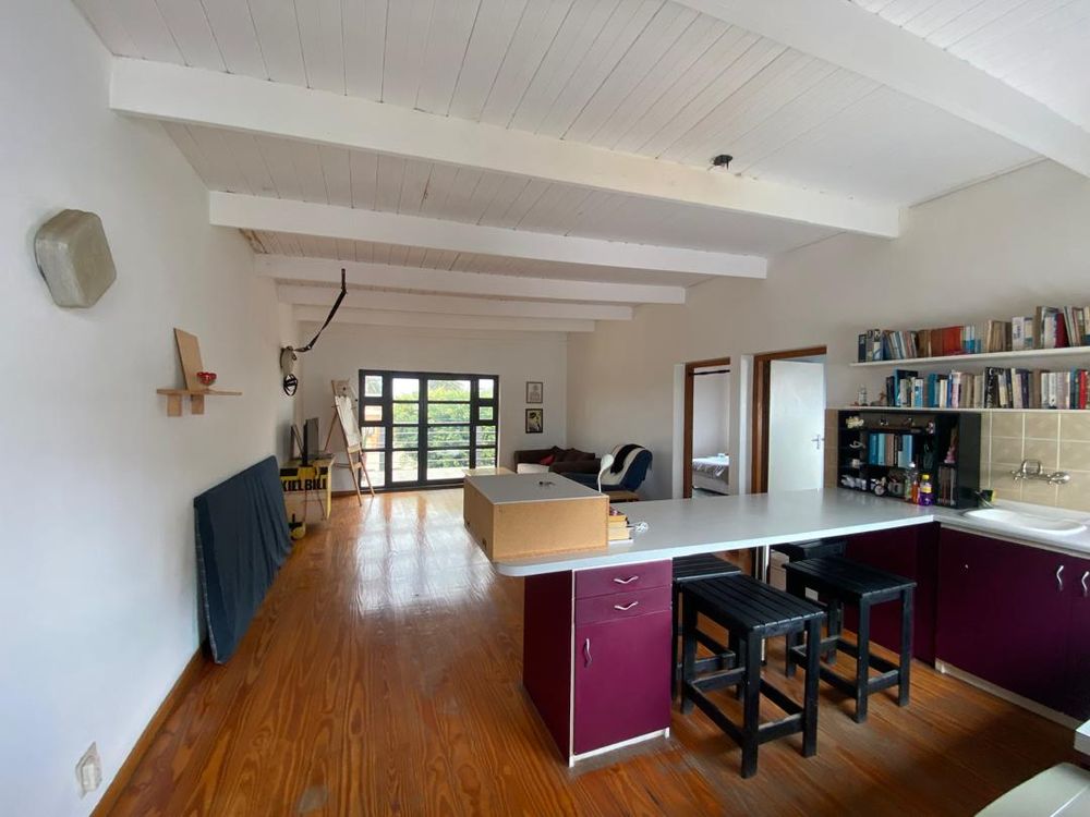 Flat one with a lounge, balcony, kitchen, bedroom and bathroom