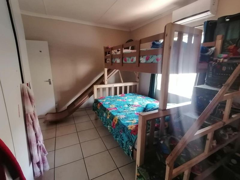 This charming 3-bedroom home offers spacious living areas, a modern kitchen, and a cozy backyard perfect for relaxation. - Photo 7