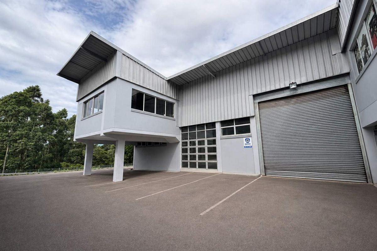 Neat Industrial Unit with Roller Door Access, Offices & Mezzanine Space - Photo 2