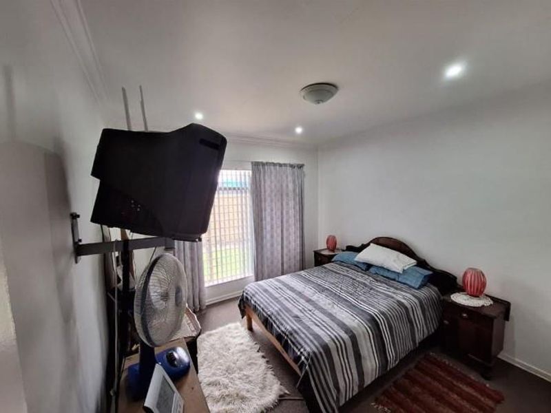 Move-In Ready 3 Bedroom Family Home with Solar, Enclosed Area - Photo 10