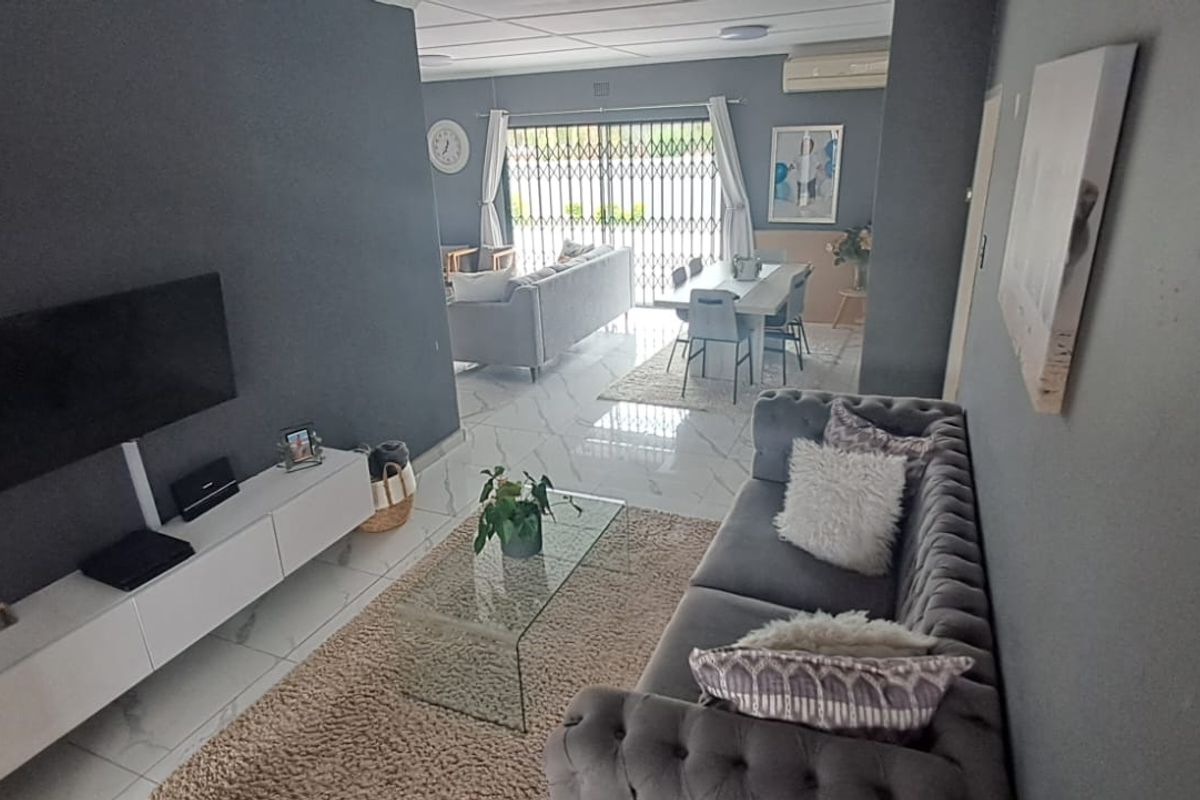 Step into this spacious and well-appointed 4-bedroom home, designed for comfortable family living and effortless entertaining. - Photo 2