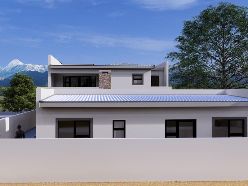 A modern rear elevation of a house featuring a corrugated metal roof, stone cladding accents, and a surrounding boundary wall with mountain views.