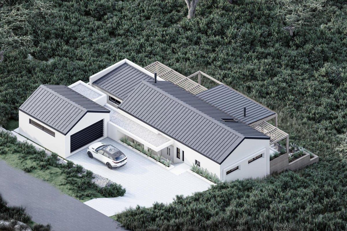 Aerial view of a modern residential property featuring a metal roof, attached garage, paved driveway, and timber pergola set within a landscaped environment.