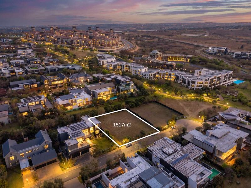 An aerial view of a 1517m2 vacant residential plot located within a developed estate, highlighting the surrounding neighborhood infrastructure.