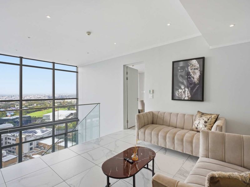 Sky-High Living: Stunning Sandton Penthouse with Panoramic Views - Photo 10