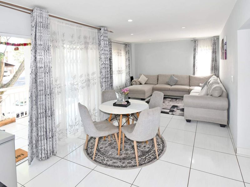 Light-Filled Living with Peaceful Green Views in a Secure Estate - Photo 3