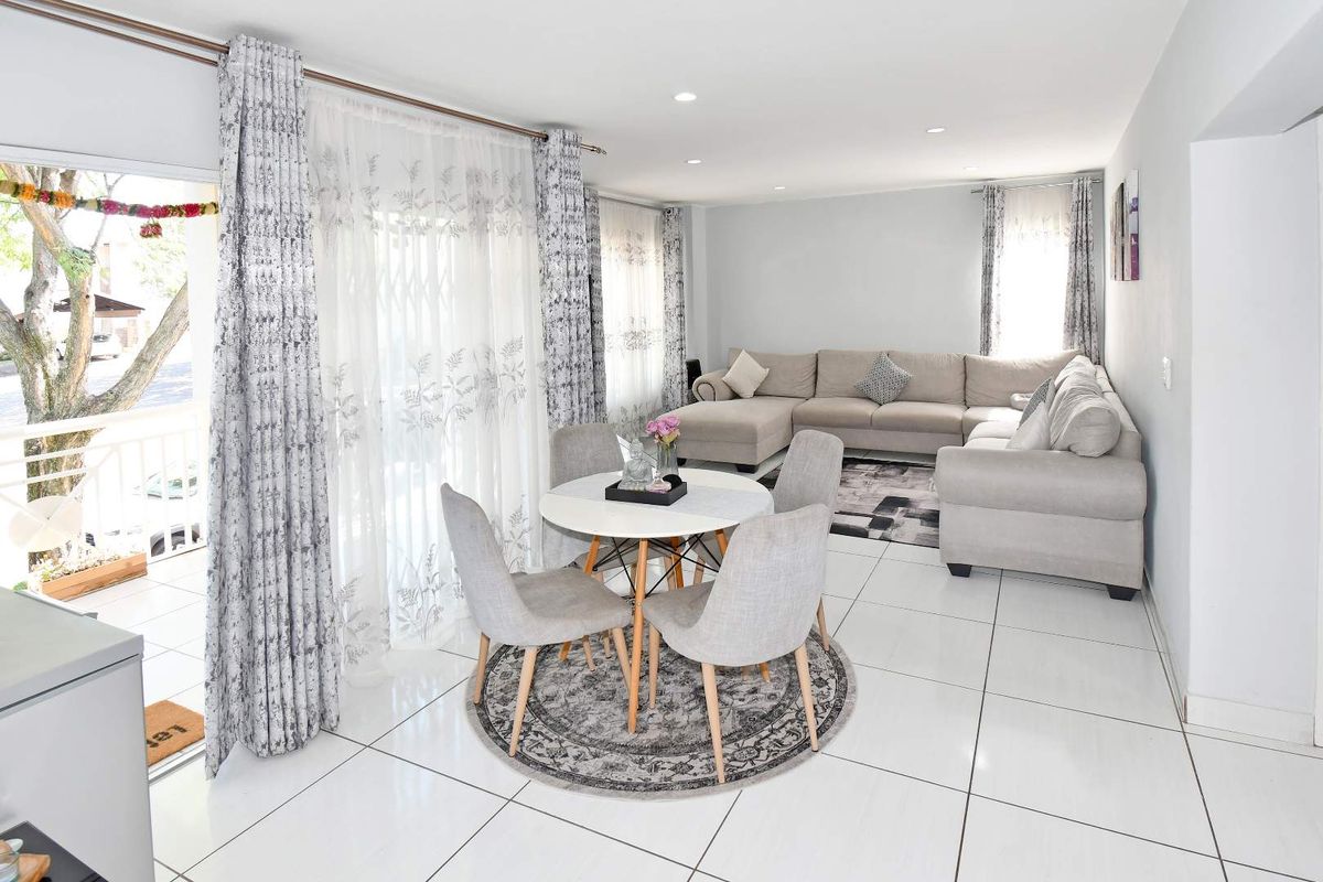 Light-Filled Living with Peaceful Green Views in a Secure Estate - Photo 3