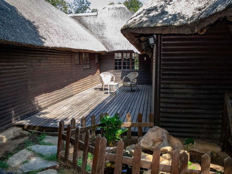 Charming Turnkey Investment – Character-Filled Thatch Roof Home - Photo 4