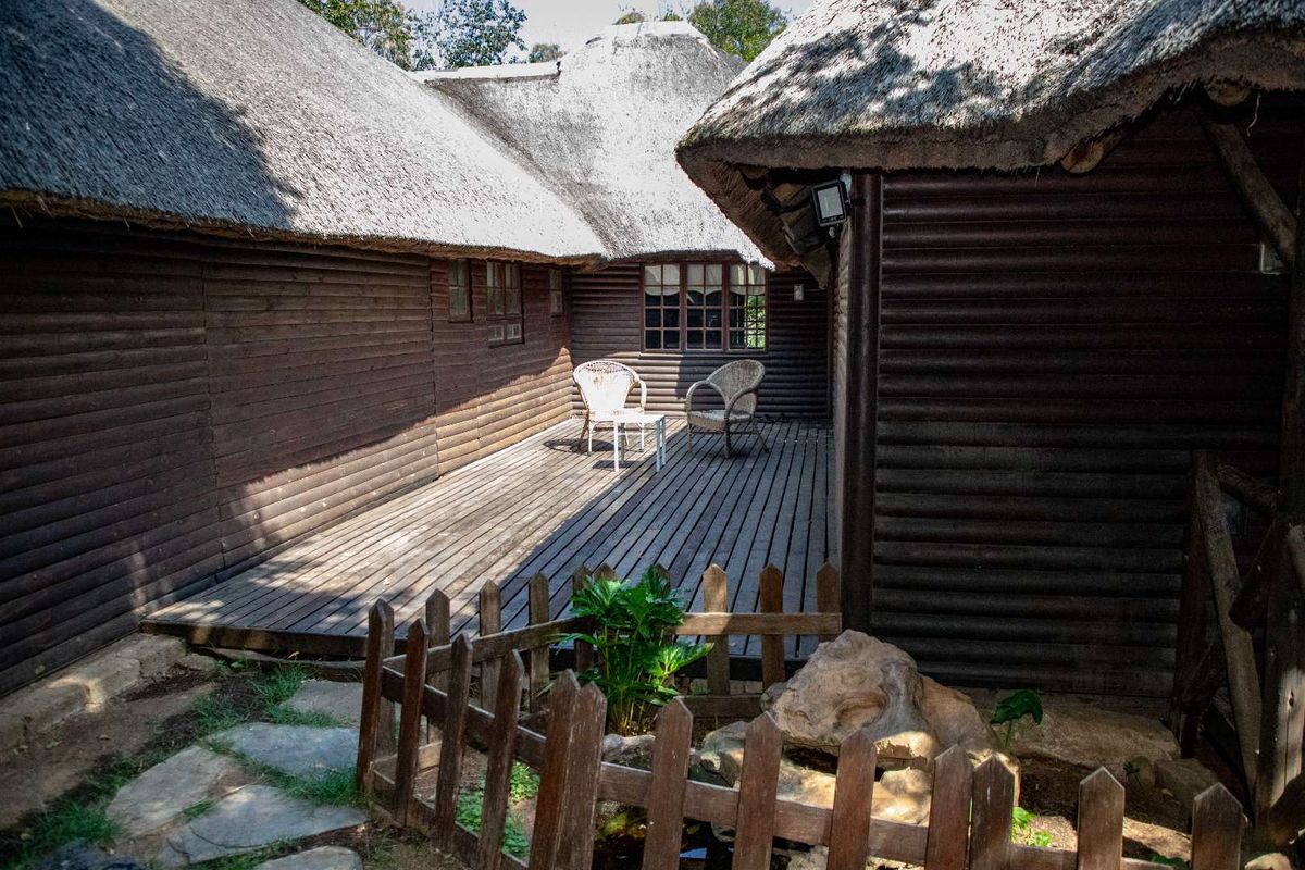 Charming Turnkey Investment – Character-Filled Thatch Roof Home - Photo 4