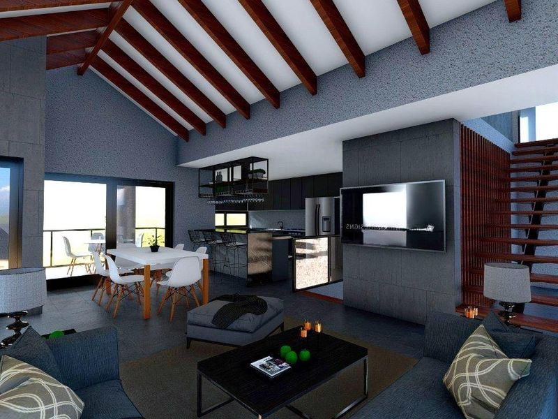 Modern open-plan living area featuring high vaulted ceilings with exposed timber beams, a sleek kitchen, and a contemporary staircase.
