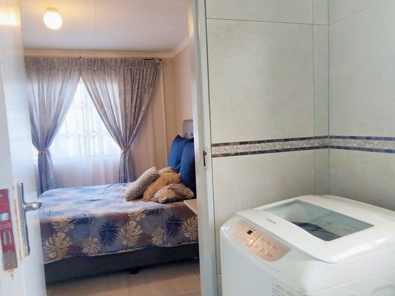 3-Bedroom Home in Gated Savanna City Community - Photo 7