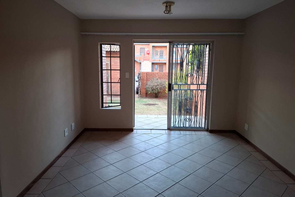 Two Bedroom Ground Floor Unit in Secure Complex - Photo 5