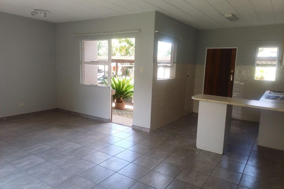 Secure Ground Floor Townhouse with Modern Comforts & Lifestyle Amenities - Photo 4