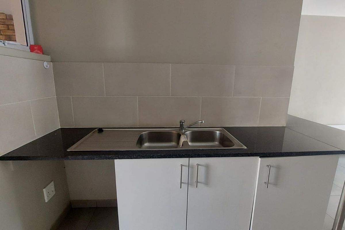 Your Perfect 2-Bed Unit: Backyard, Patio & Extra Storage - Photo 2