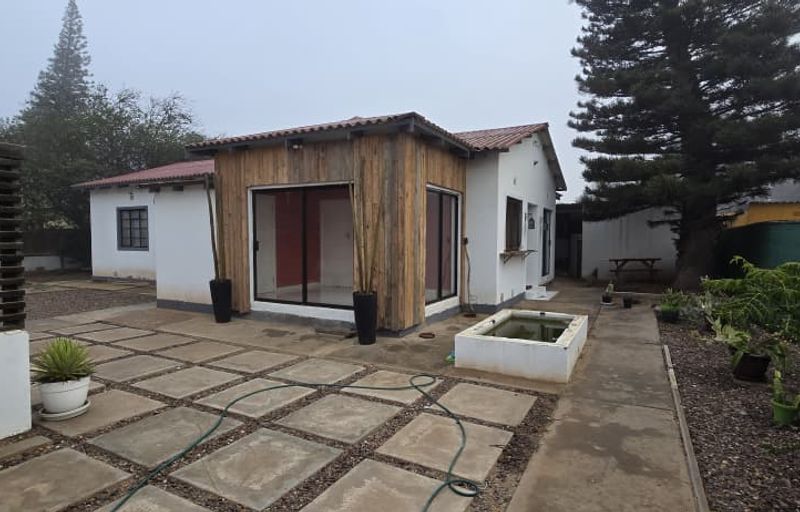 Low Maintenance 3-Bed Home with Dry Yard & Storage Rooms
