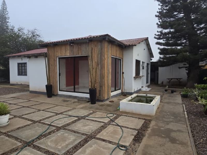 Low Maintenance 3-Bed Home with Dry Yard & Storage Rooms - Photo 1