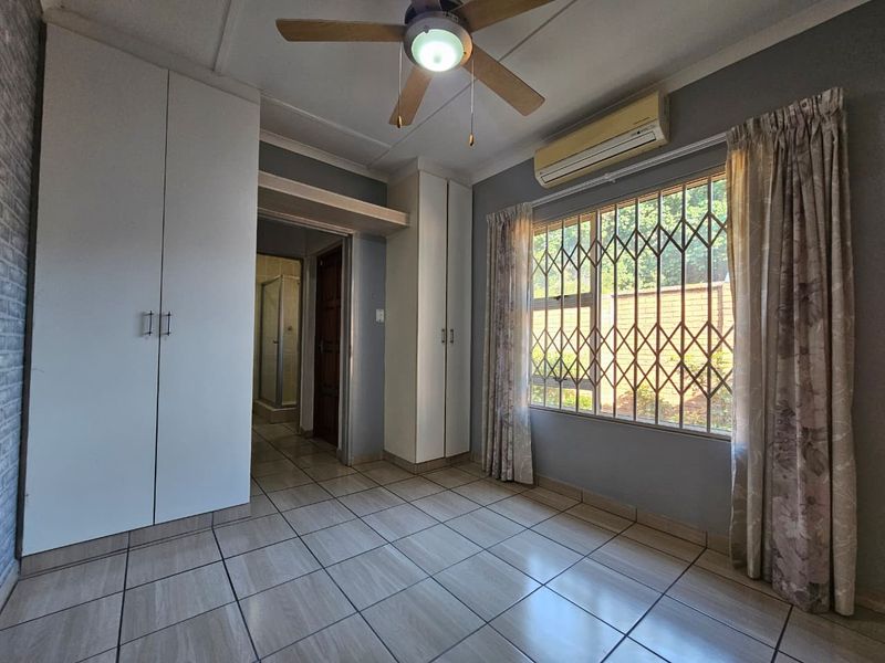 Four-Bedroom Family Home with Pool and Braai in Arboretum - Photo 8