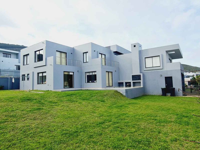 Elegant Family Living with Spectacular De Grendel Wine Farm Views - Photo 9