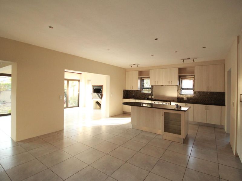 Elegant Family Living in a Quiet Cul-de-Sac | Blue Valley Golf Estate - Photo 5