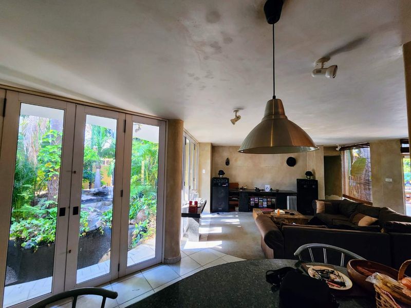 Mid-Century Modern Oasis with Lush Tropical Garden and Private Office - Photo 7