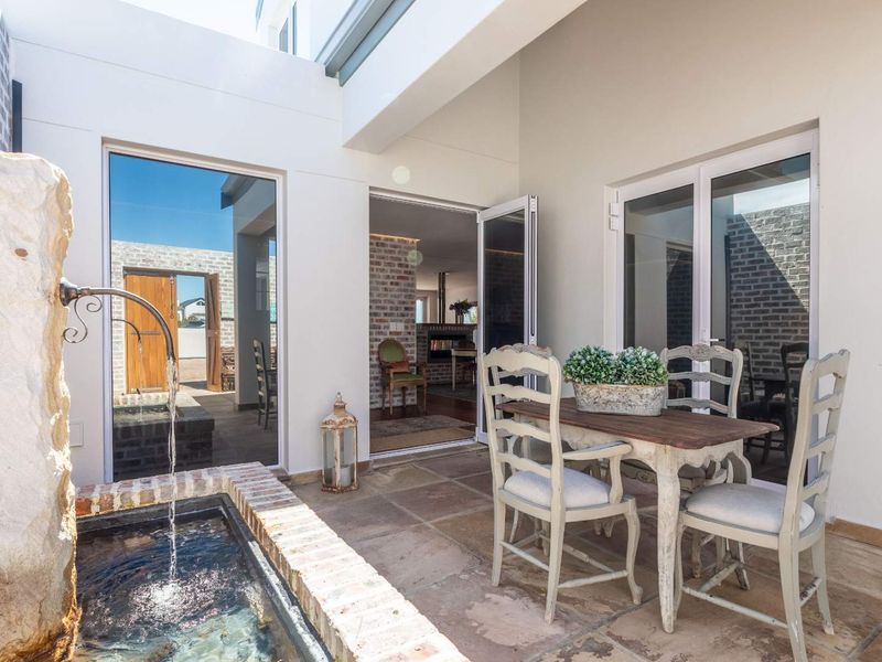 Secure and Luxurious Coastal Living - Photo 7