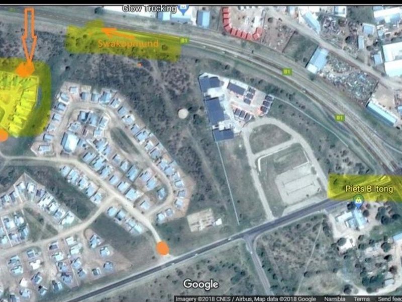 An aerial satellite view showing the property location within the surrounding neighborhood and local infrastructure.