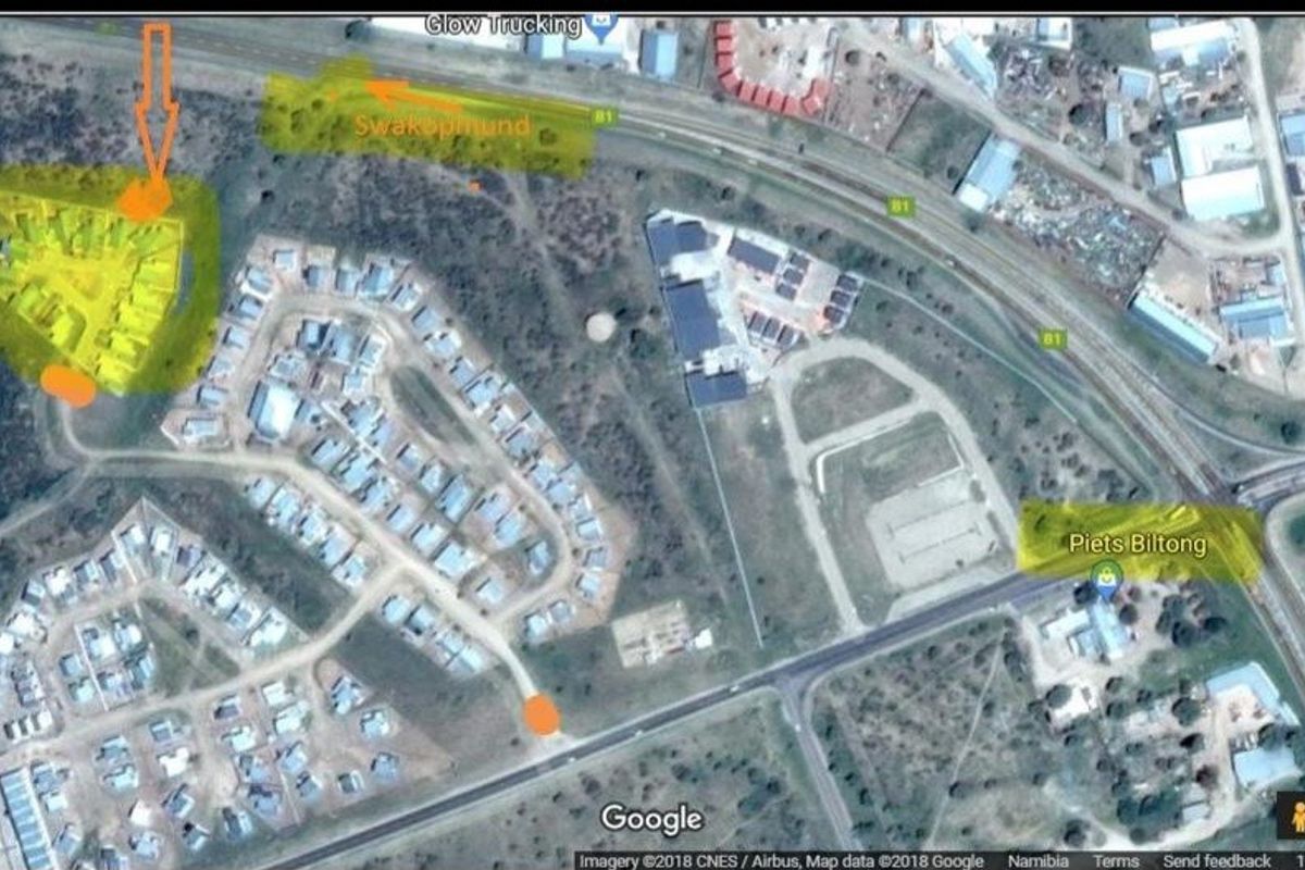 An aerial satellite view showing the property location within the surrounding neighborhood and local infrastructure.