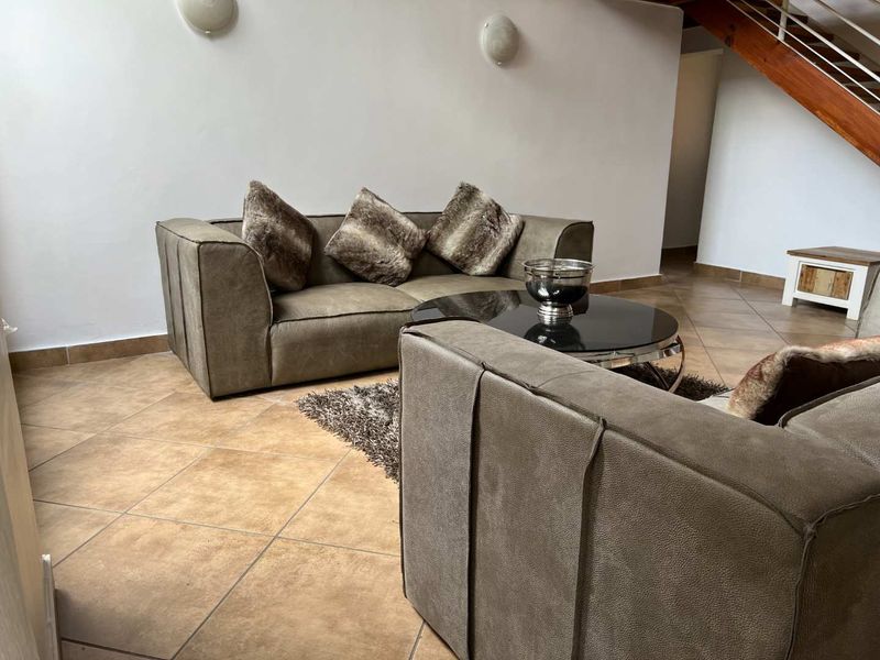 GENEROUS LIVING SPACE AND CHARM - FURNISHED - Photo 2