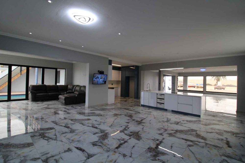 Open living with kitchen and TV room