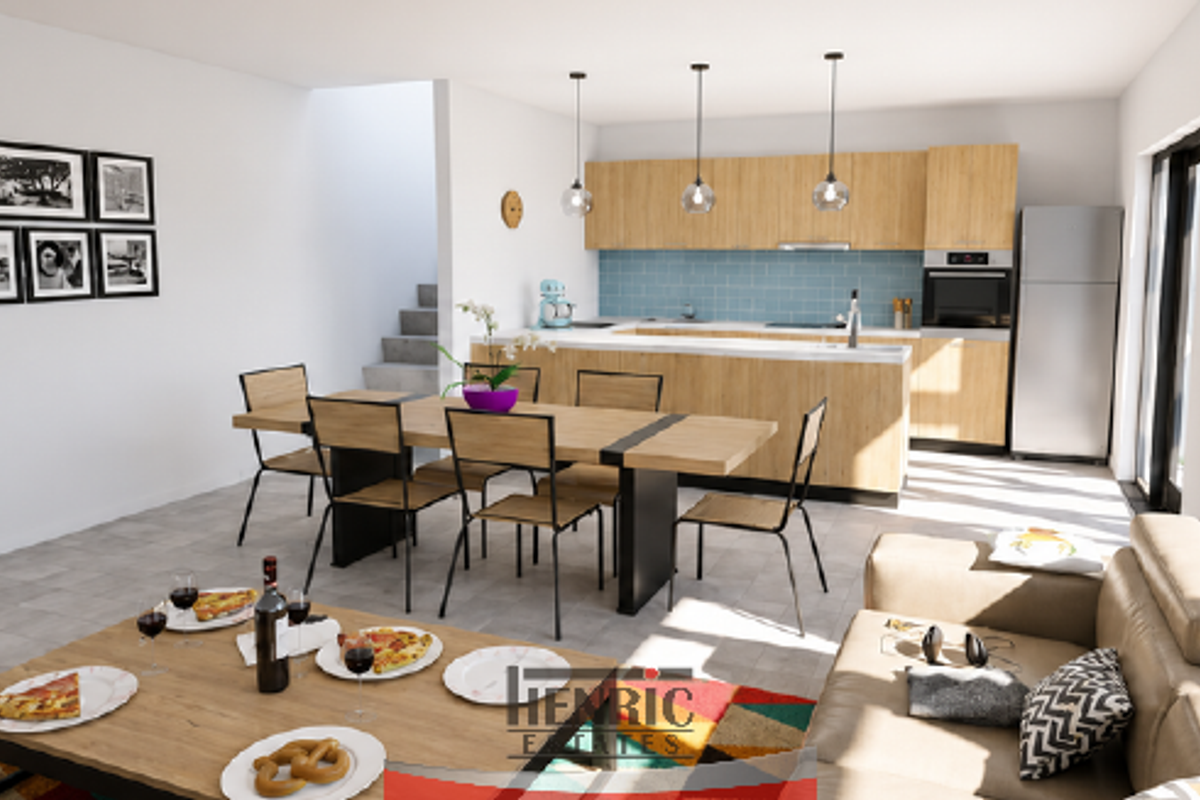 Modern open-plan living and dining area featuring a contemporary kitchen with light wood cabinetry, integrated appliances, and direct access to outdoor space.