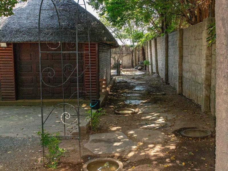 Charming Turnkey Investment – Character-Filled Thatch Roof Home - Photo 9