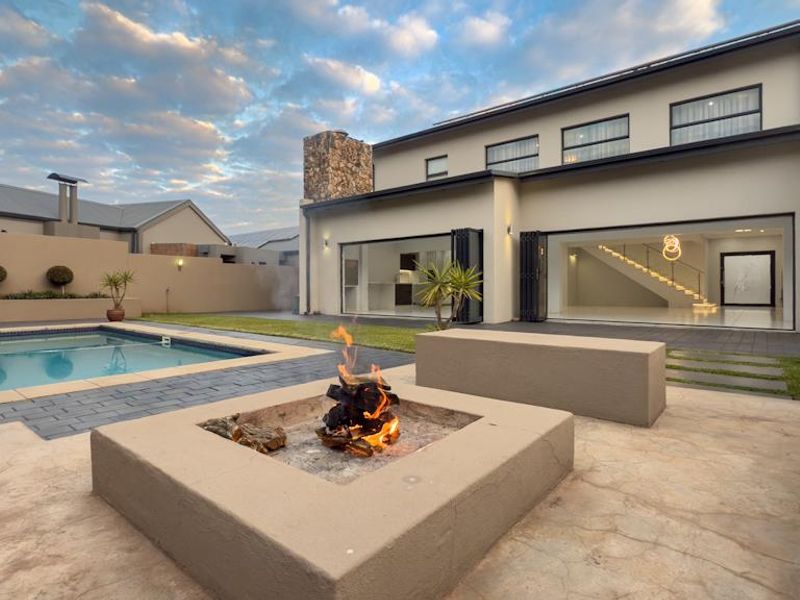 Hilltop Haven | Modern Multi-Level Marvel with Solar Power, Blueline Kitchen & Entertainer’s Garden - Photo 7