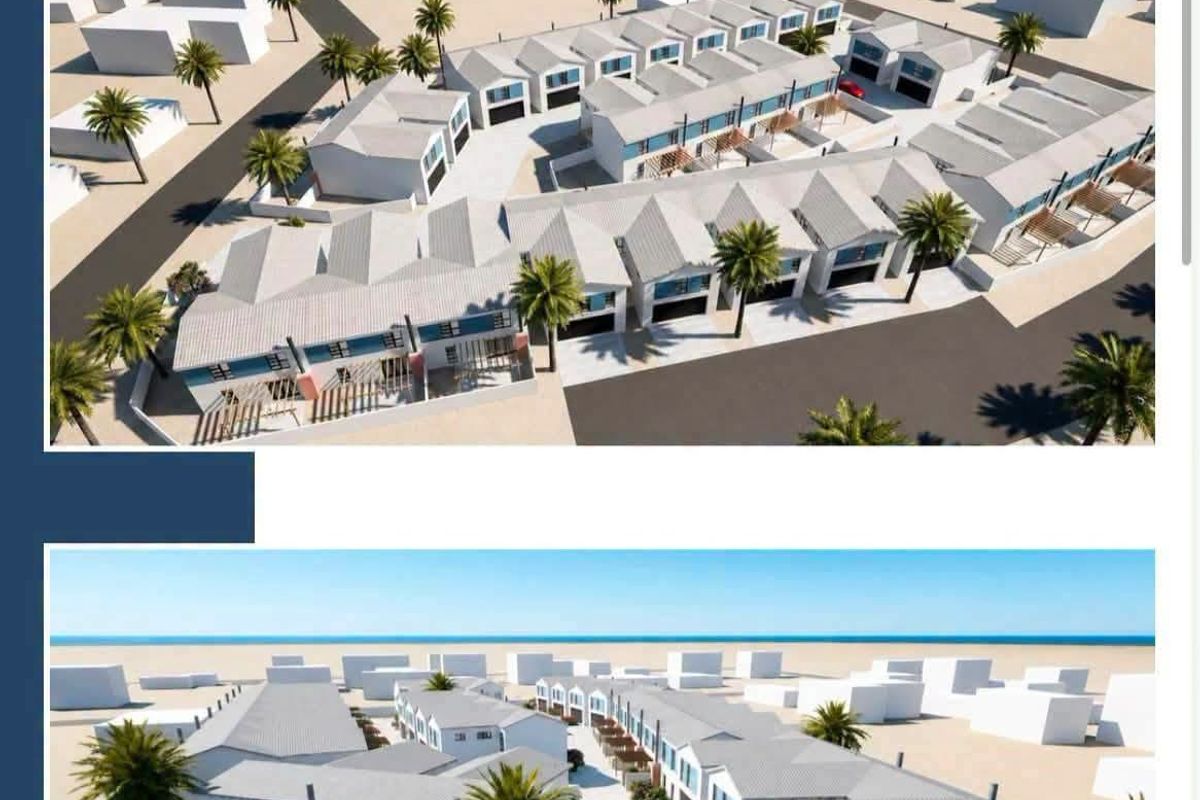An aerial 3D render of the Valora Estate townhouse development, showcasing the layout, roof structures, and exterior design of the residential units.