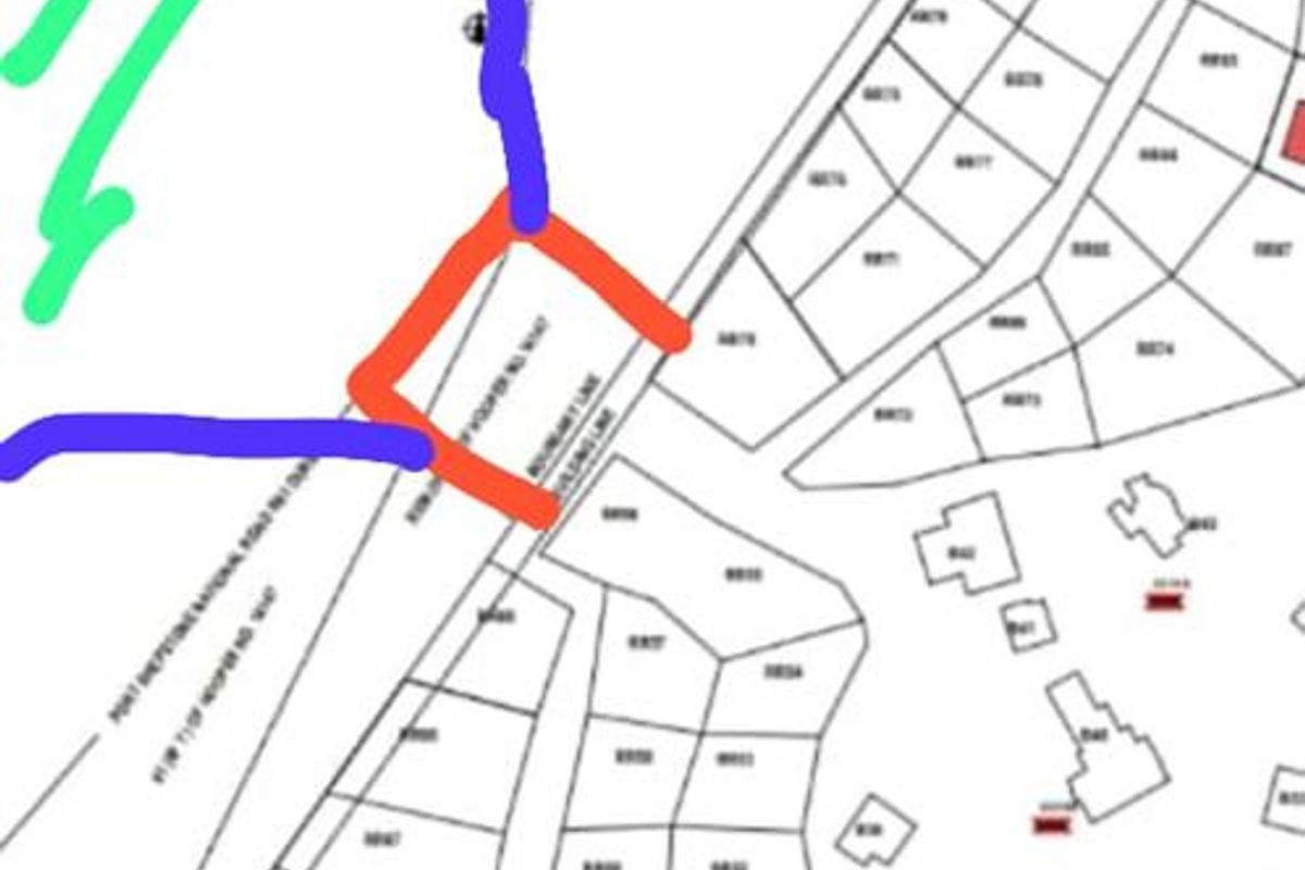 A site development plan showing the layout and boundaries of the residential land plot.