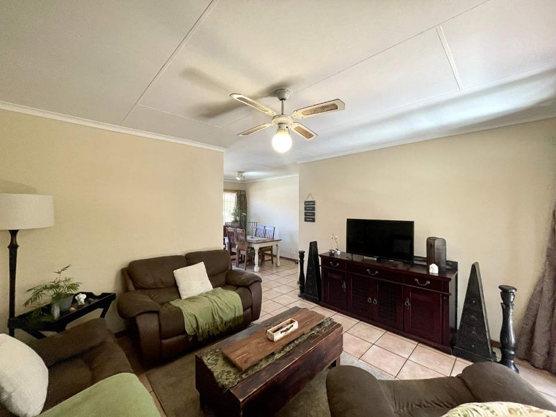 Secure Estate Living with Pool, Fishing Dam & Excellent Rental Appeal - Photo 6