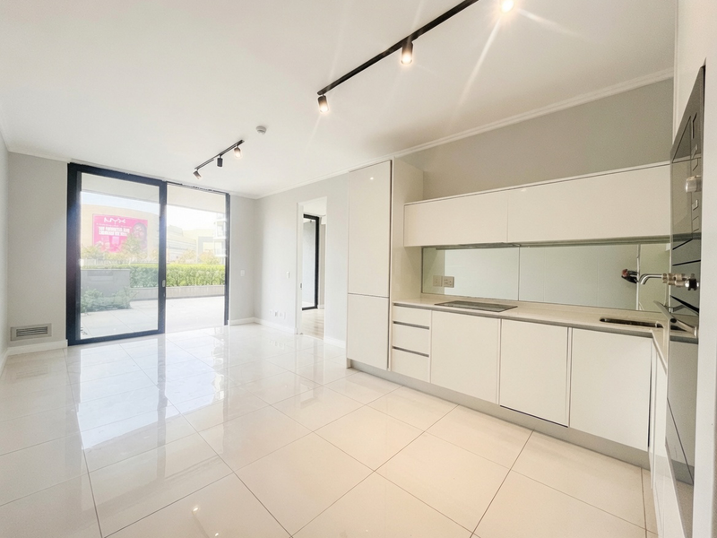 Luxury Ground-Floor Living with Expansive Patio at Ellipse Waterfall - Photo 4
