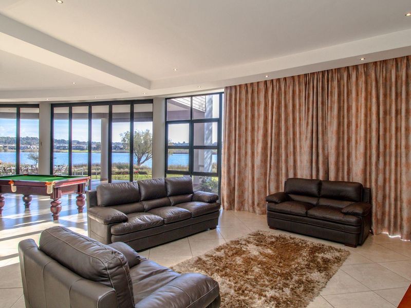 Waterfront Elegance in Ebotse: Your Dream Home Awaits! - Photo 8