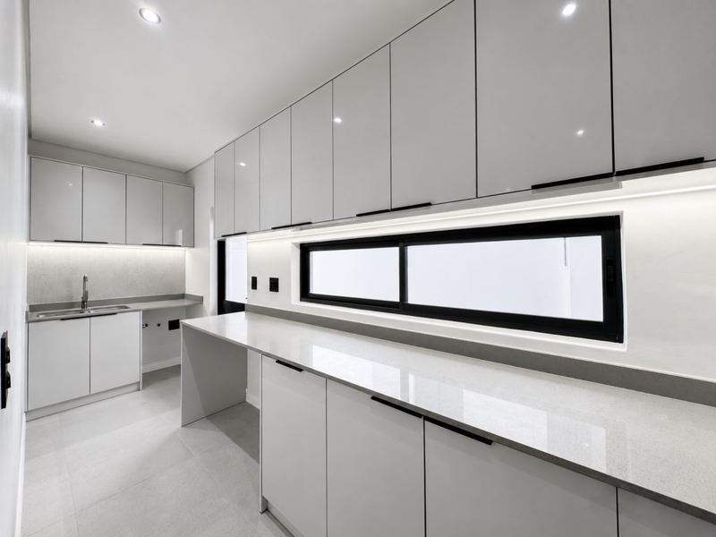 Striking Modern Home with Floating Staircase & Luxury Finishes in Sandown, Cape Town - Photo 7